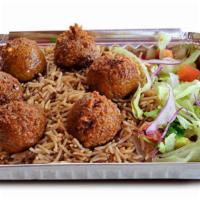 Falafel Over Rice · Grounded deep fried mixed vegetables (6 pieces)  served over brown basmati with choice of sa...