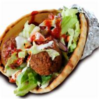 Falafel On Pita · Grounded deep fried mixed vegetables (4 pieces) served on pita with choice of salad and any ...