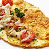 Eastern Omelette · Sizzling hot Omelette made with Tomato, onions, and peppers. Served with a side of home frie...
