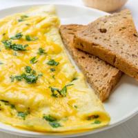 Cheese Omelette · Sizzling hot Omelette made with a mixed blend of cheeses, onions, and peppers. Served with a...