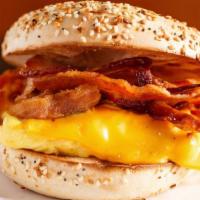 Bacon, Egg, & Cheese Sandwich · Delicious Breakfast sandwich topped with 2 cooked eggs, crispy bacon, and melted cheese. Ser...
