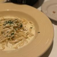 Fettuccine Alfredo · The Roman classic presented in the traditional manner.