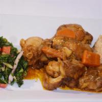 Brown Stew Chicken · Served w one side & either steam veg or plantain (when avail)