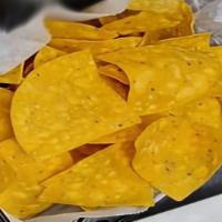 Nick’S Nachos · Shredded cheddar, sour cream, pico de gallo and guacamole.