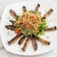 Portobello Mushroom Salad · Warm marinated portobello mushrooms, mixed greens, fried goat cheese and crispy fried leeks,...