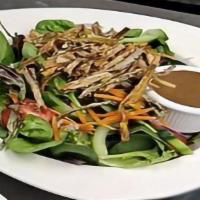House Salad · Mixed greens, tomatoes, shredded carrots, red onions, cucumbers, topped with crispy fried le...