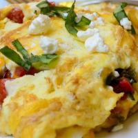  Greek Omelet Platter · An omelet served with scrambled eggs, kalamata olive, feta and cherry tomatoes. All Platters...