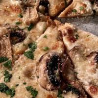 Truffle Mushroom Pizza · Truffled marsala cream sauce, cremini & button mushrooms, fresh mozzarella.