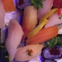 Sushi Deluxe · 9 pcs of assorted sushi & 1 tuna roll.