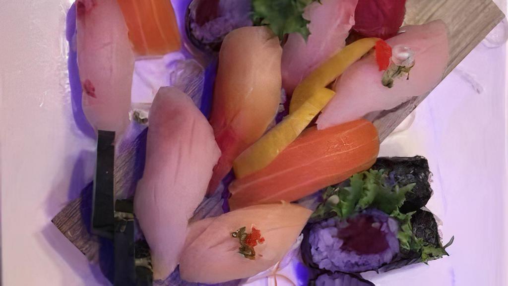 Sushi Deluxe · 9 pcs of assorted sushi & 1 tuna roll.