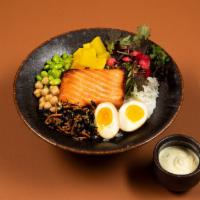 Miso Glazed Salmon Bowl · Roasted miso-marinated salmon served with white rice, edamame, chickpea, hijiki quinoa, oshi...