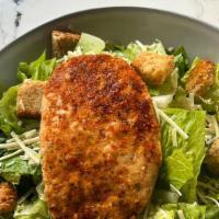 Chicken Caesar Salad · Plant based chicken served on a bed of Romaine lettuce, shaved pecorino romano, herbed crout...