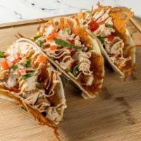 Seared Chicken Tacos · Marinated chicken breast served topped with pico de gallo, salsa verde, served on a corn tor...
