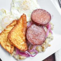 Mangu Spanish Breakfast · Mashed green plantains with two eggs, fried onions, white cheese and salami or Spanish sausa...
