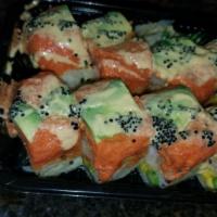 Tenda Roll · Lobster tempura, mango, asparagus inside, topped with spicy tuna, avocado, served with spicy...