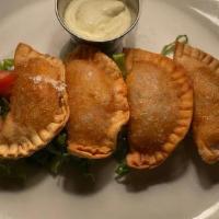 Espinaca Y Requeson Empinadas · Spinach and spanish style ricotta cheese