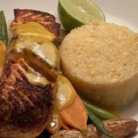 Pan Seared Salmon · Tequila coconut cream sauce served with slightly roasted vegetables & Mexican rice
