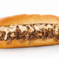 Philly Cheesesteak · Steak with grilled onions & melted white shredded cheese on a 6