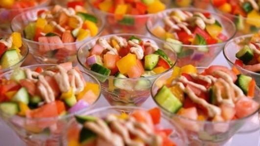 Israeli Salad Bowl · Cucumbers, tomatoes, parsley, chickpeas, kalamata olives, radishes, baked falafel, tahini dressing.