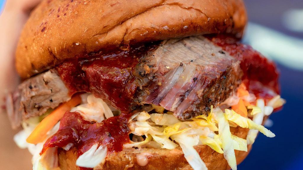 Bbq Brisket Sandwich · Brioche bun, smoked Bbq brisket, house pickles, lettuce, house creamy sauce, Bbq sauce.  **FOR FRIES: please note, fries are not recommended by Jolene's for delivery, because of uncontrollable delivery times. Soups hold up much better during delivery**
