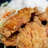 Fried Chicken & Gravy Rice Plate · Buttermilk fried chicken, gravy, steamed rice, tossed green salad.