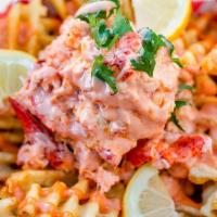 Lobster Fries · Waffles fries, lobster meat, house fry sauce, Asian Cajun butter, cilantro.  **FOR FRIES: pl...