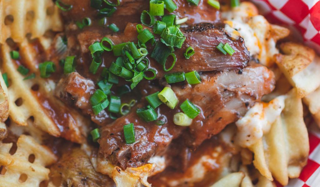 Bbq Brisket Fries · Waffle fries, mozzarella cheese, smoked Bbq brisket, Bbq sauce, cilantro.  **FOR FRIES: please note, fries are not recommended by Jolene's for delivery, because of uncontrollable delivery times. Soups hold up much better during delivery**