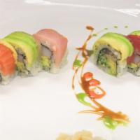 Rainbow Roll · Crabmeat, cucumber, avocado, and masago inside with raw assorted fish on top.