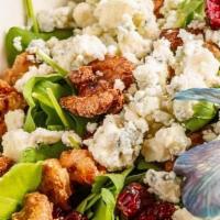 Arugula Salad · Arugula, dried cranberries, bleu cheese cumbles, candied walnuts & lemon vinaigrette