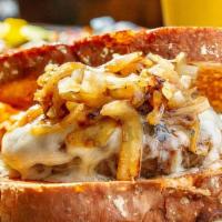 Patty Melt · Beef burger topped with grilled sauteed onions, melted swiss on country white bread