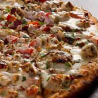 Bacon Chicken Ranch Flatbread · Grilled chicken, pecan bacon, diced tomato, mozarella, drizzles with ranch dressing.