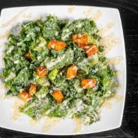 Kale Caesar · Parmesan, Homemade croutons, kale & romaine
with creamy caesar dressing.