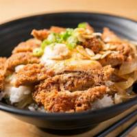 Bowl Of Rice Topped With Pork Cutlet · Donburi.
