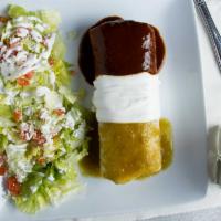 Burrito Mi Bandera · Stuffed with rice, beans, cheese and meat of choice covered with green sauce, mole sauce and...
