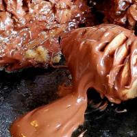 Nutella Stuffed Chocolate Chip Cookie Dough · 2 layers of gooey and buttery cookie dough stuffed with Generous amount of Nutella and loade...