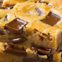 Gooey Chocolate Chip Bar · An ooy gooey, buttery cookie bar loaded with chocolate chips.