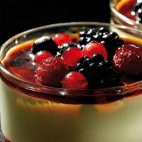 Creme Brulee & Berries · A layer of raspberry sauce topped with a creamy custard and decorated with mixed berries coa...