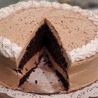 Mocha Cake Slice · rich chocolate cake infused with espresso, accompanied by a fluffy mocha buttercream and top...
