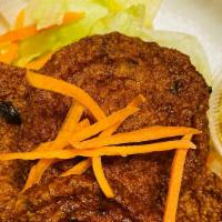 Fish Cake · Spicy. Seafood nuggets. Mixed crab meat, fish, and shrimp, seasoned with Thai spices, and wr...