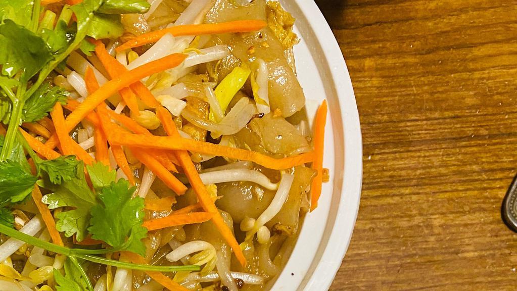 Bangkok Noodles · Fresh broad noodles, egg, celery, and bean sprouts.