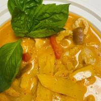 Red Curry · Spicy. Bamboo shoots, eggplant, bell peppers, and basil in curry and coconut milk. Served wi...