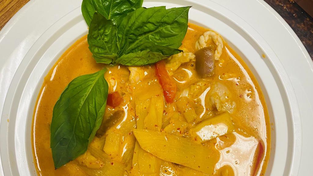 Red Curry · Spicy. Bamboo shoots, eggplant, bell peppers, and basil in curry and coconut milk. Served with jasmine rice.