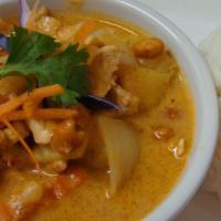 Massaman Curry · Potatoes, onion, carrot, and peanuts in curry and coconut milk. Served with jasmine rice.
