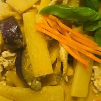 Green Curry · Spicy. Bamboo shoots, eggplant, bell peppers, and basil in curry and coconut milk. Served wi...