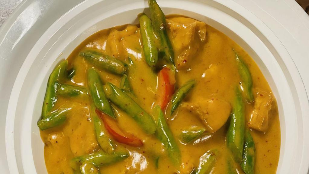 Panang Curry · Spicy. Bell peppers, kaffir lime leaves and string beans in curry and coconut milk. Served with jasmine rice.