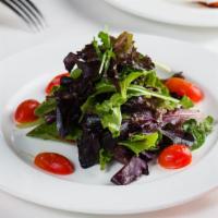 Insalata Mista · Mixed greens salad with carino's house dressing.