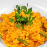 Risotto Milanese · Italian Arborio Rice Sauteed with Saffron and Chopped Asparagus