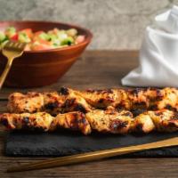 Chicken Kebab · One skewer of white or dark meat grilled over fire marinated in Italian seasoning.