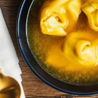 Wonton Soup · The best way to satisfy any Chinese food craving. Homemade chicken broth and steamed wontons.