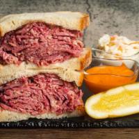 Corned Beef · Delightful and hot sliced corned beef available as a Sandwich or as a Plate. . The Corned Be...